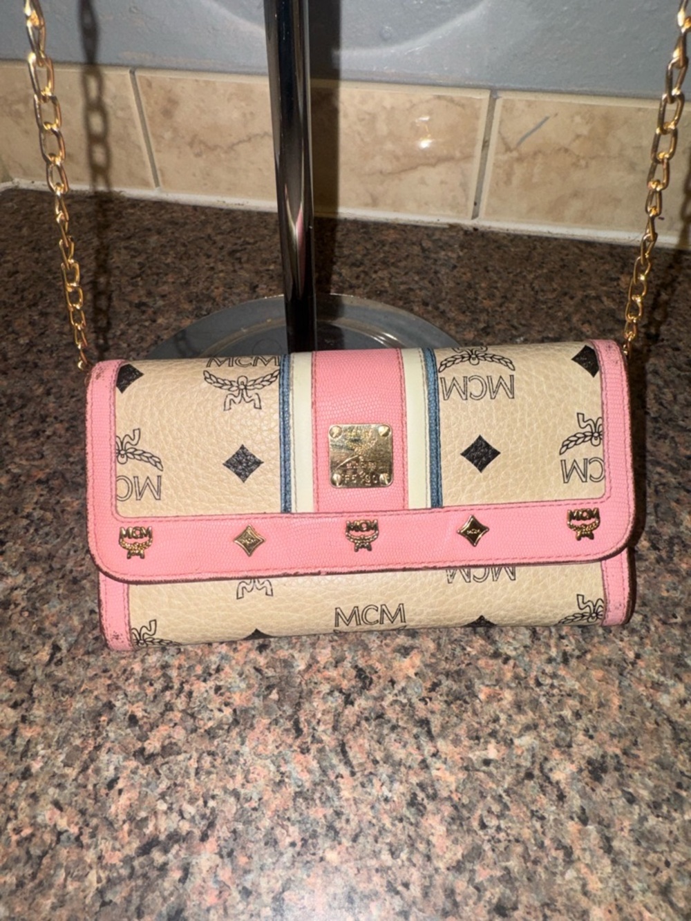 MCM limited edition, pink long snap wallet with an unbranded Crossbody chain